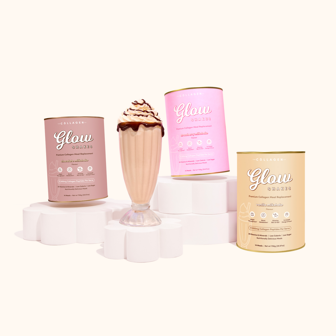 Three cans of Glow Shakes (vanilla, strawberry, and chocolate) are showcased with corresponding milkshakes in tall glasses topped with whipped cream and chocolate fudge.